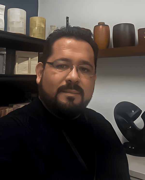 Hector Funeral Director inside his office